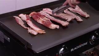 BLACKSTONE GRIDDLE SEASONING amp FIRST BACON COOK [upl. by Barkley]