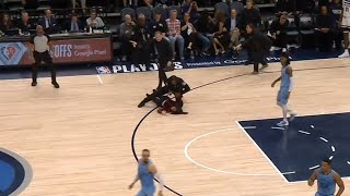 Fan runs on court and gets tackled by security during Grizzlies vs Timberwolves [upl. by Formenti]