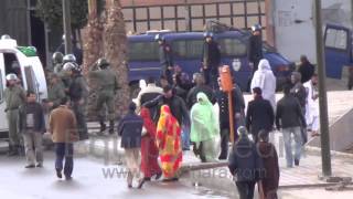 جانب اخر من التدخل الذي طال الجماهير الصحراوية بشارع السمارة بالعيون المحتلة 15022014 [upl. by Euqinotna442]