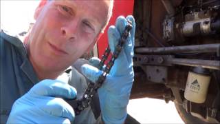 Changing the oil filter on a Massey Ferguson 265 tractor [upl. by Gnilsia353]