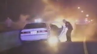 Cops Save Man From Burning Car DASH CAM VIDEO [upl. by Oniram229]