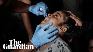 Children receive polio vaccination in Gaza after inoculation campaign begins [upl. by Aicileb]