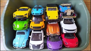 Box Full of model cars  Porsche Tesla Peugeot Volvo Closeup toy car review Tomica L108 [upl. by Enilecram]