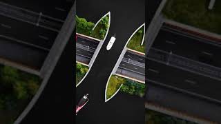 Drone Footage Disappearing bridge carries boats across Dutch motorway [upl. by Abshier581]