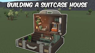 BUILDING A SUITCASE HOUSE IN BLOXBURG [upl. by Sagerman]