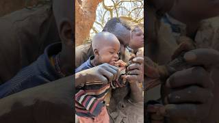 Sweet food 😋  See how Hadza fathers share meal with their kids  Real father and daughter love 🔥 [upl. by Nylyaj]