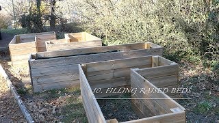 10 Filling Raised Beds Hugelkultur [upl. by Ytsud]