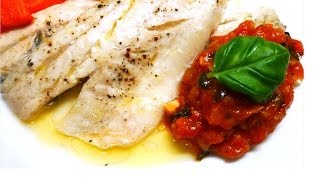 Roasted Sea Bass in lemon juice and butter served with tomato and basil sauce [upl. by Vassily]