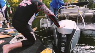 Barefoot Skiing Behind a Manitou SHP Pontoon equipped with an Evinrude G2 outboard [upl. by Northway]