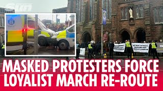 Masked group guard Catholic church forcing Loyalist march to reroute [upl. by Denison764]