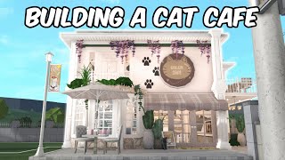 BUILDING A CAT CAFE IN MY BLOXBURG TOWN [upl. by Farnsworth934]