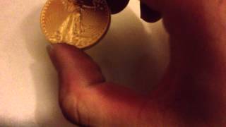 Weighing a 1 Ounce Gold American Eagle Bullion Coin [upl. by Niklaus62]