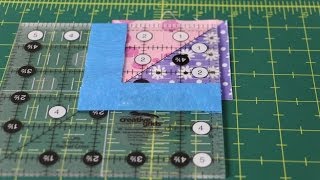 How to Square Up Half Square Triangles using a Creative Grids Square Up Ruler with Painters Tape [upl. by Acnayb827]