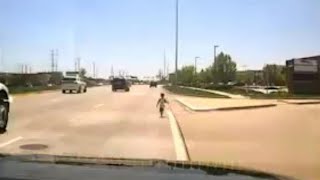 Cop Rescues Toddler Wandering Along Illinois Highway [upl. by Norven817]