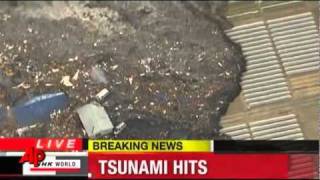 unnaturally moving object At the crest of the tsunami wave Japan 11 03 2011flv [upl. by Blakelee]