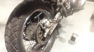 XT600e Rear Brake Caliper Rebuild  pistons and pads [upl. by Eirised]