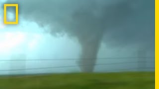 Tornadoes Lightning in Rare Video  National Geographic [upl. by Blunt]