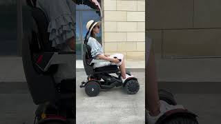 Heightadjustable electric wheelchair [upl. by Forta826]