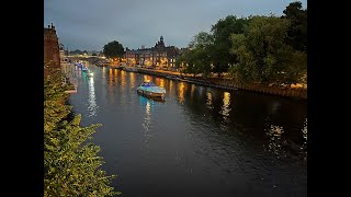 Flotilla of illuminated boats in York [upl. by Nhaj]