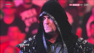 The Undertaker Returns on WWE Raw 1000 And Helps Kane [upl. by Langsdon]