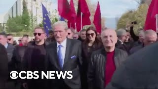 Albanian opposition leader Sali Berisha punched in the face during antigovernment protest [upl. by Jillene]