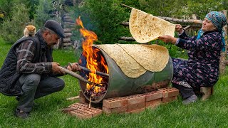 🌶️ Traditional Lavash Bread Baking Bread on a Barrel Over Wood Fire [upl. by Airotcivairam563]