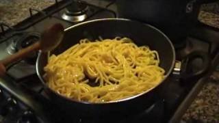 Tagliolini con burro fuso basilico e pancetta croccante video ricetta n° 052 [upl. by Thessa68]