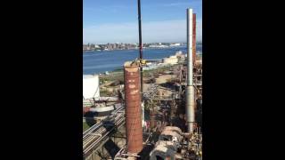 Crane suspended Brokk 160  Industrial Chimney Takedown DEMOLITION XP INC [upl. by Schenck]