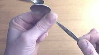 How to dissolve a spoon with your fingertips the Uri Geller way [upl. by Hindorff]