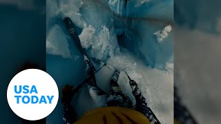 Scary moment a skier falls down the crevasse in French Alps  USA TODAY [upl. by Shandee]