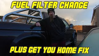 Changing the fuel filter on a Mitsubishi L200 K74  Get you home fix [upl. by Annaiviv]