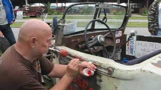 Pinstriping the rat rod at the car show with live rock n roll [upl. by Eimrots]