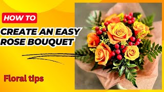 How to create an easy simple bouquet with orange roses red hypericum solidago and leather leaves [upl. by Briano]