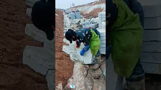 Process of laying hexagonal stone block on the slope [upl. by Gnuj]