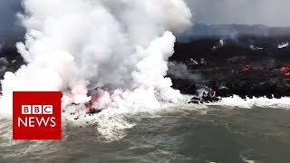 Molten lava meets the sea  BBC News [upl. by Egiedan982]