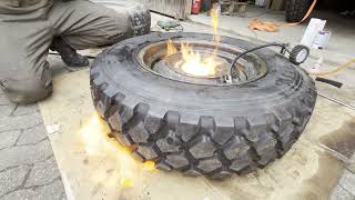 Unimog 404 S  Explosive  Mounting New Tires [upl. by Llerrad125]