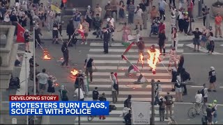 ProPalestinian protesters burn flags scuffle with police near Philadelphia City Hall [upl. by Htezil]