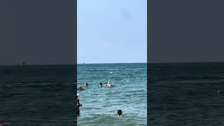 Summer Fun Laying on The Sea Mykonos Beach greecebeach greece [upl. by Nahtnoj939]