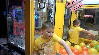 KID CLIMBS INTO CLAW MACHINE [upl. by Sadnalor]