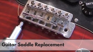 How to replace guitar bridge saddles [upl. by Eudora]