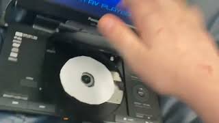 Putting A Paper Disc In A DVD Player [upl. by Daley]