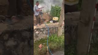 The process of irrigating fields with a portable water pump [upl. by Darrelle992]