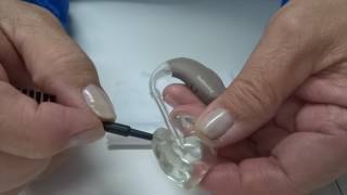 How to Clean a BTE Behindtheear Hearing Aid [upl. by Rabbaj]