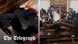 Riot breaks out in New York City synagogue over secret tunnel [upl. by Nelra375]