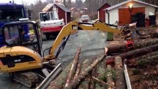 Collecting firewood with CAT 3025C and homemade tracked vehicle [upl. by Dunn]