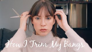 HOW TO TRIM YOUR BANGS AT HOME Plus Tips for Disguising Bangs [upl. by Aicirtal357]