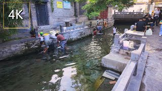 People in Jinan are washing clothes with spring water Walk to the modern mall next to the old city [upl. by Enenaj]