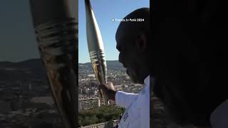 Basile Boli lance le relais de la flamme olympique à NotreDame de la Garde à Marseille [upl. by Anek315]