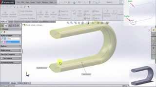 SOLIDWORKS Tutorial Swept Boss and Swept Cut [upl. by Aennyl]