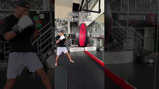 Single Arm Boxing Drill 🥊 Great boxing mma muaythai boxingtraining fight ko boxingworkout [upl. by Akimot]